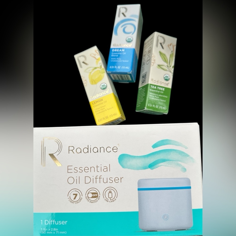 Bundle of radiance, essential oil diffuser, and three oils new in box